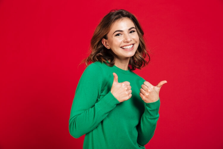 903smiling-young-pretty-woman-standing-isolated